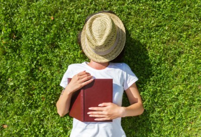 woman resting in a field